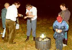 Steve McWilliam, Dave Edwards and Paul Hillyer around Paul's Home-made Moth-trap at Moore Nature Reserve, Warrington, Cheshire